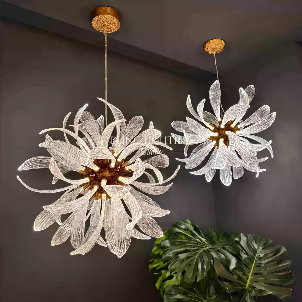 Pair of Dandelion round glass chandeliers installed in a dark room scene