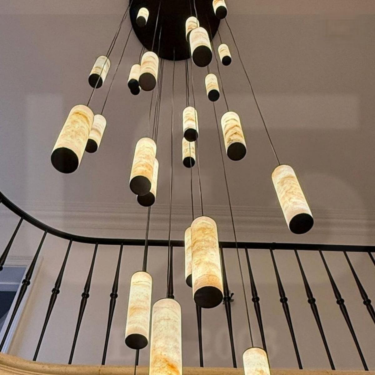 Darlen Alabaster Modern Staircase Chandelier cascading alabaster tube pendant lounge view