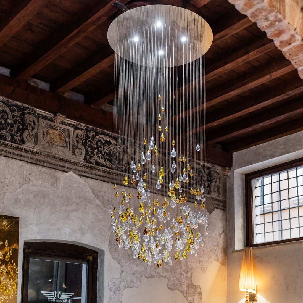 Droplets Sculpture Chandelier chandelier in a tall interior