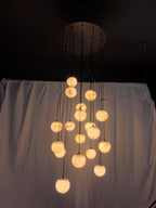 Faye Marble Bubble Chandelier lit installation view
