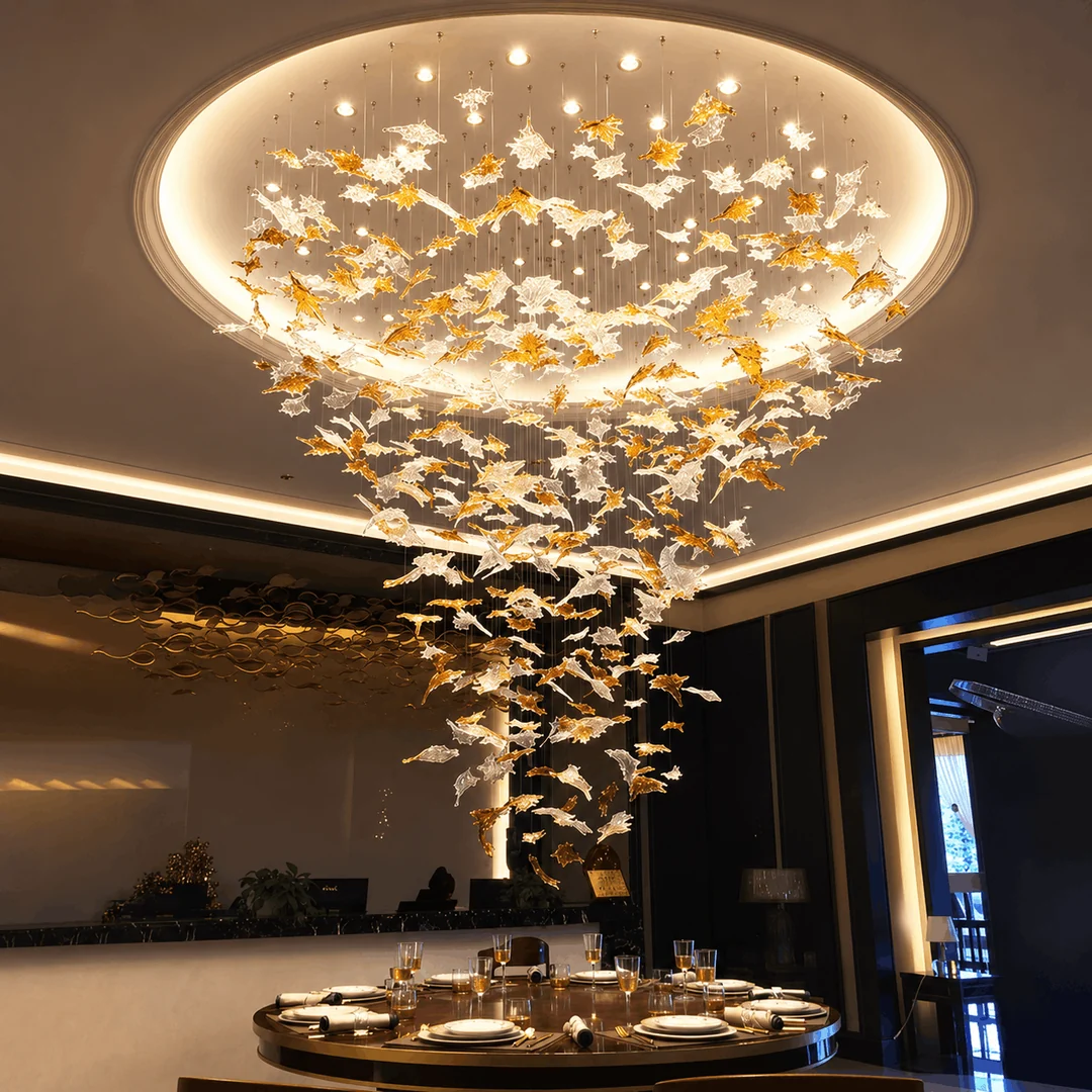 Glass Maple Leaf Hanging Light for Staircase with round canopy and cascading autumn leaves above a dining table