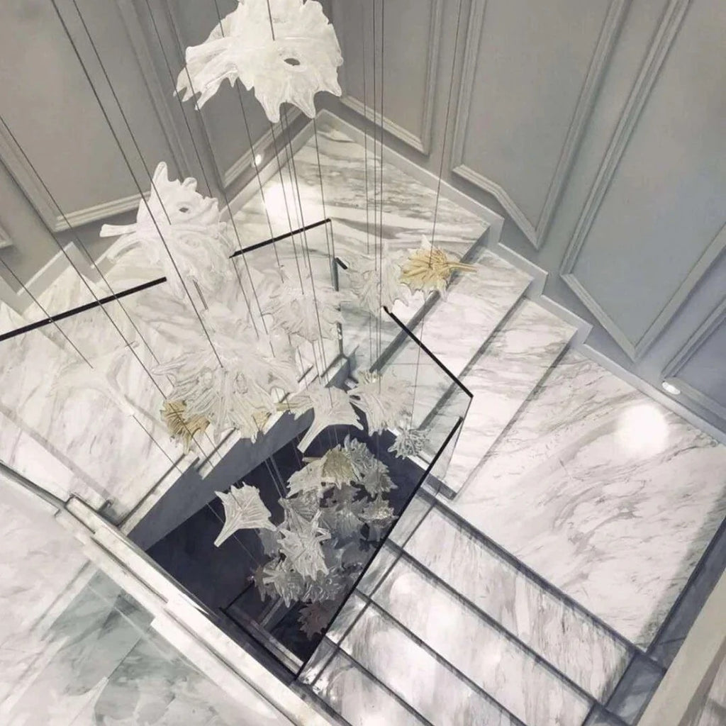 Glass Maple Leaf Hanging Light for Staircase viewed from above through a stairwell with glass maple leaves