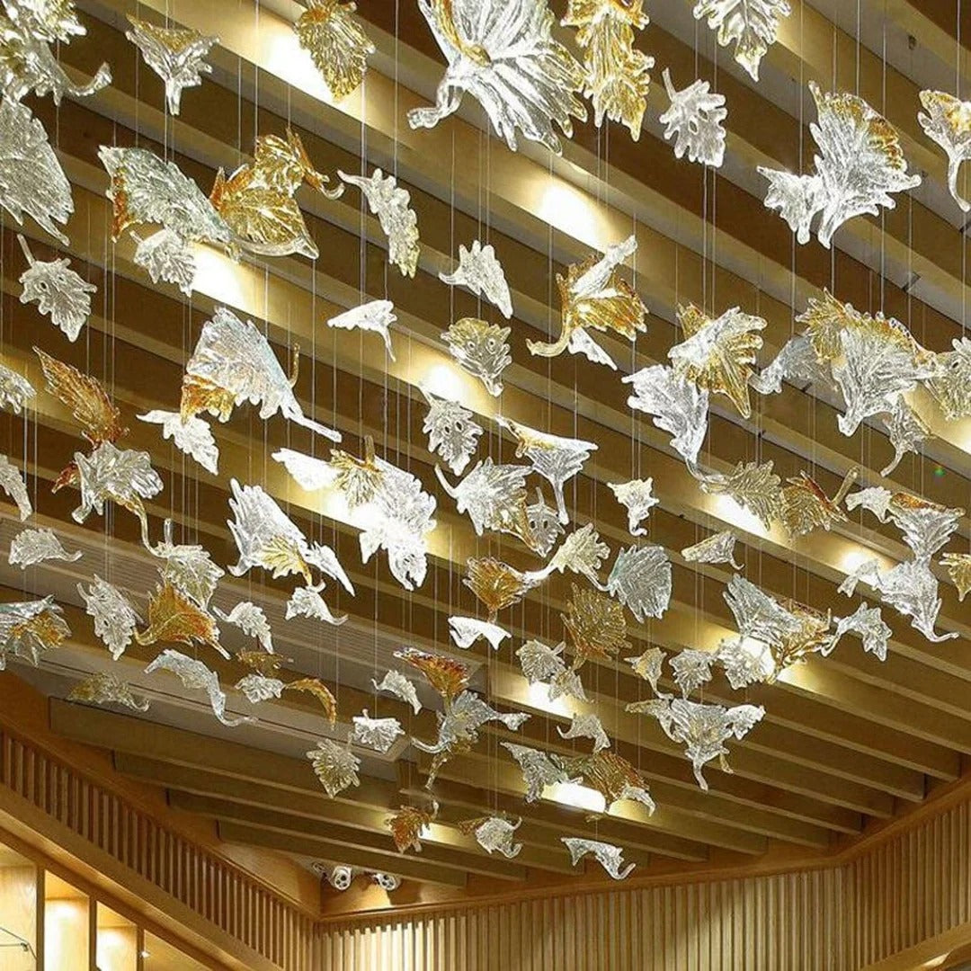 Glass Maple Leaf Hanging Light for Staircase close view under a wood ceiling with many suspended leaves