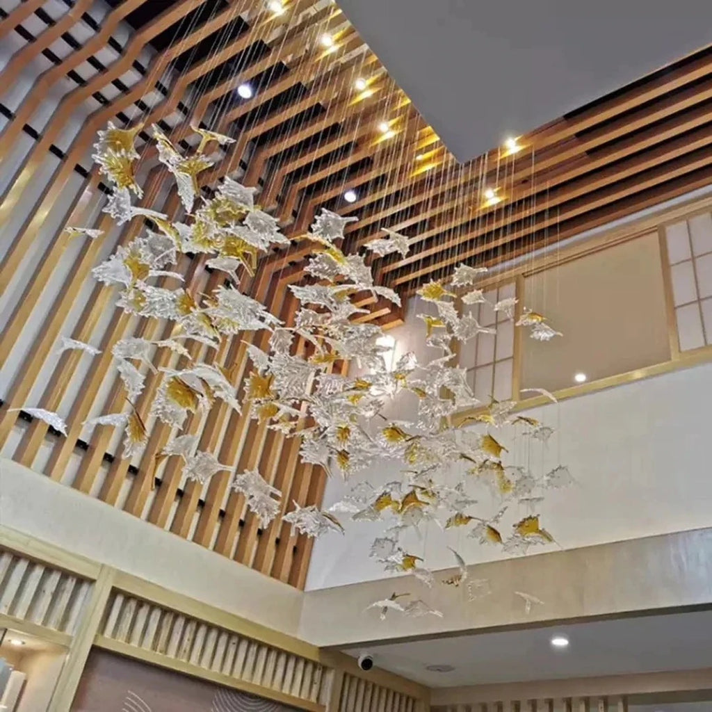 Glass Maple Leaf Hanging Light for Staircase in a high ceiling space with wood slat wall details