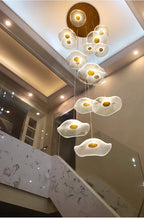 Gold Acrylic Flower Led Chandelier For Stairwell, Staircase installed in a curved foyer staircase with layered flower LED pendants