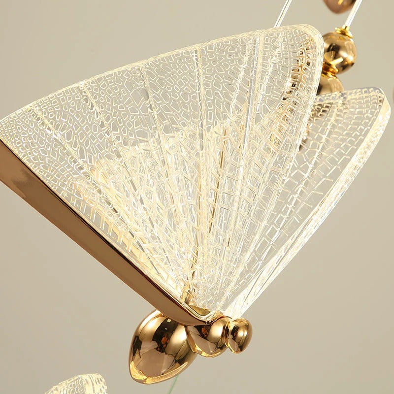 Gold Butterfly Led Chandelier for Staircase Foyer and Living Room installed in a stairwell with butterfly pendant lights