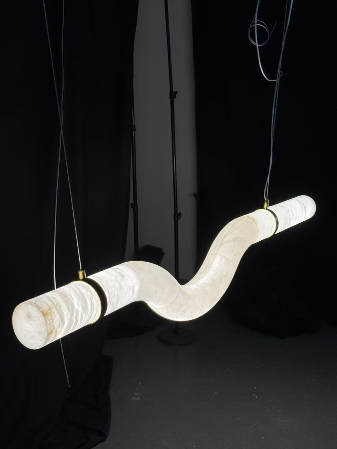 Streamlined Alabaster Linear And Curved Chandelier