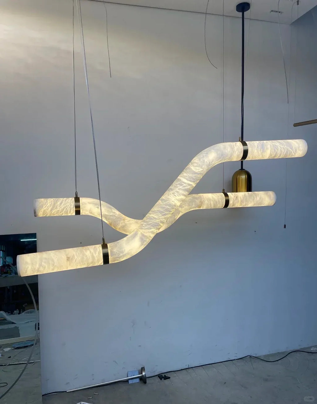 Streamlined Alabaster Linear And Curved Chandelier