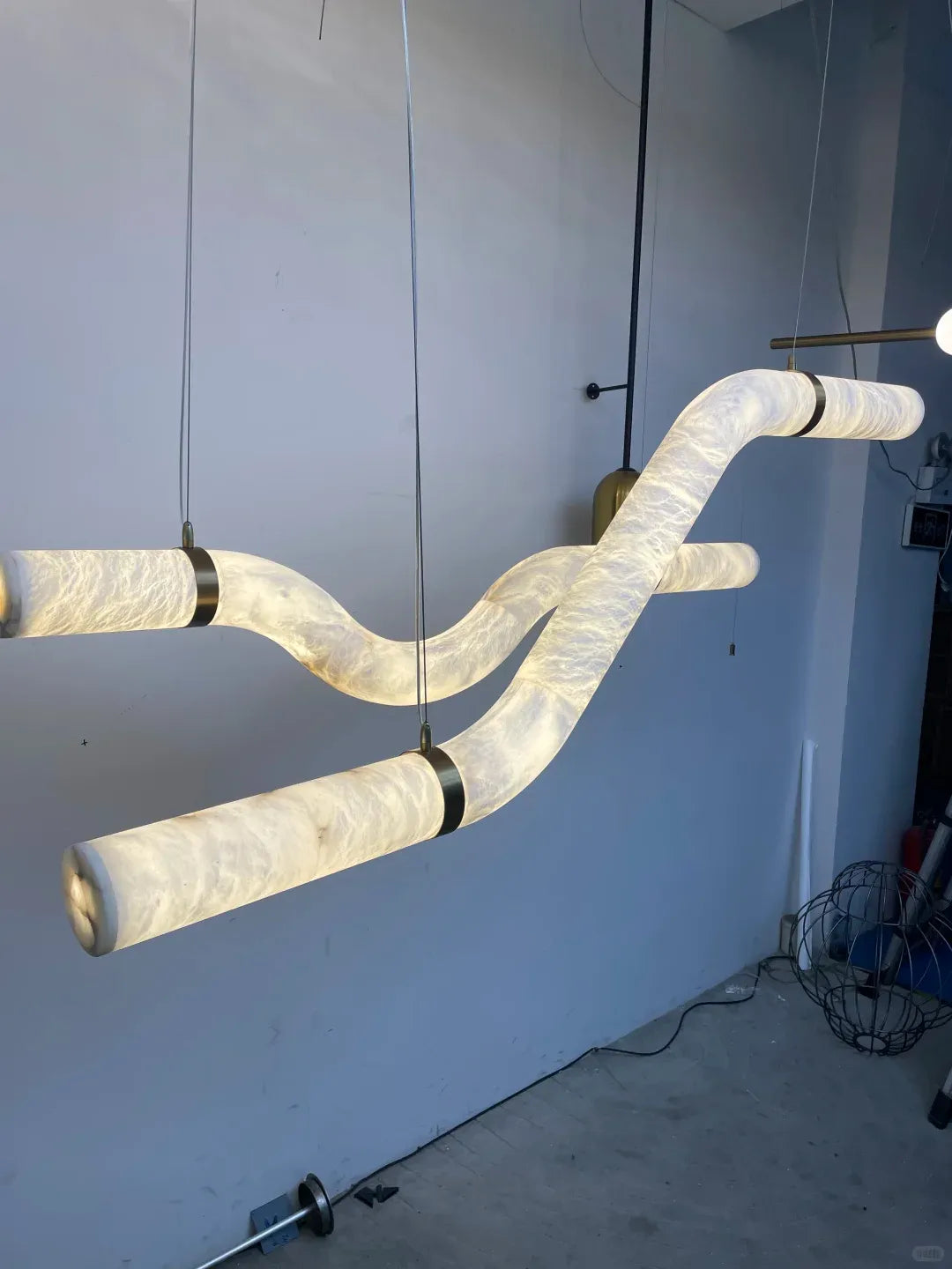 Streamlined Alabaster Linear And Curved Chandelier