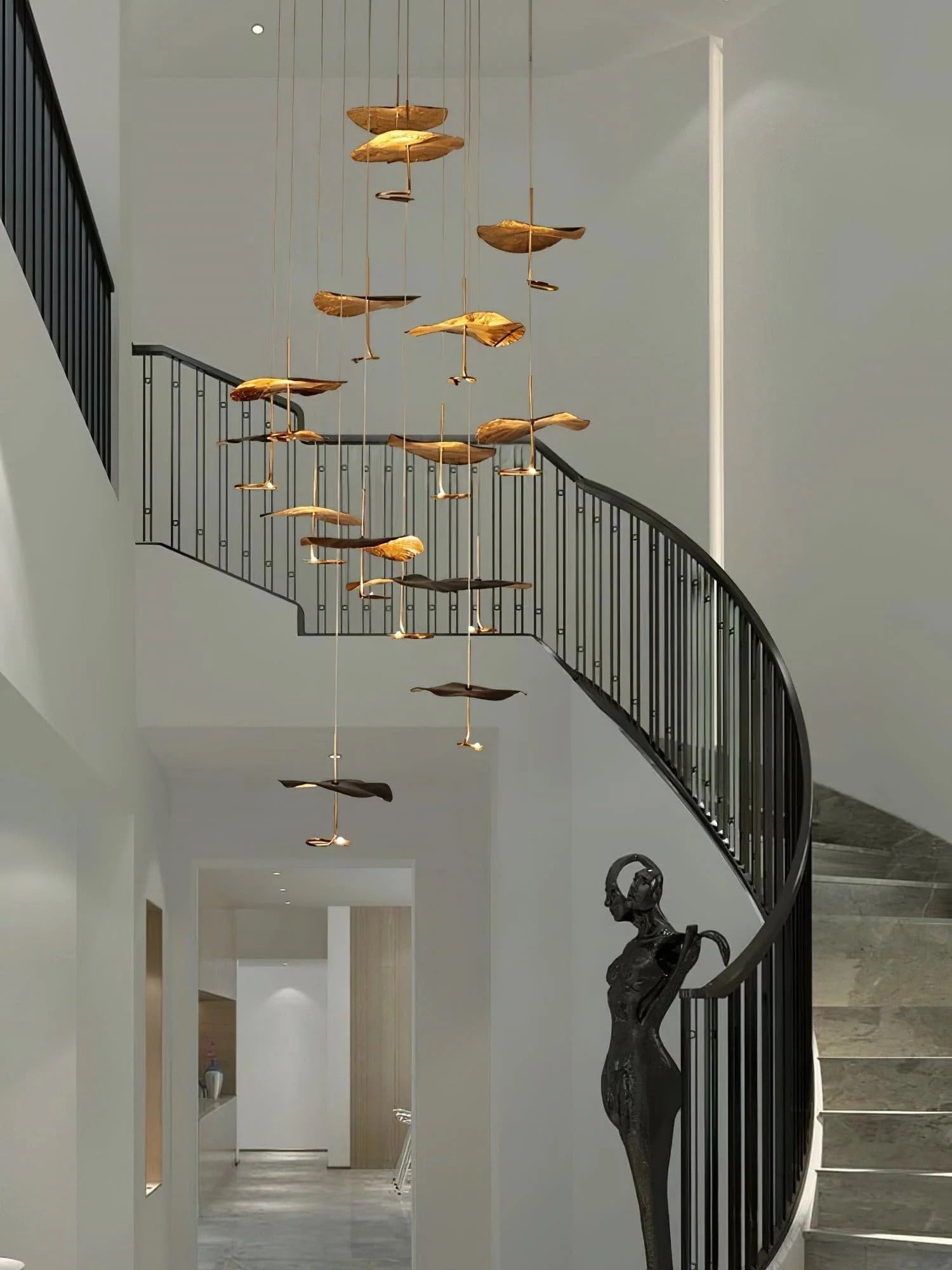 Jenissa Vintage Staircase Chandelier in a high ceiling hallway with curved staircase and gold leaf pendants