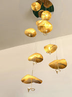 Jenissa Vintage Staircase Chandelier vertical installation with gold lotus leaf pendants at varied heights