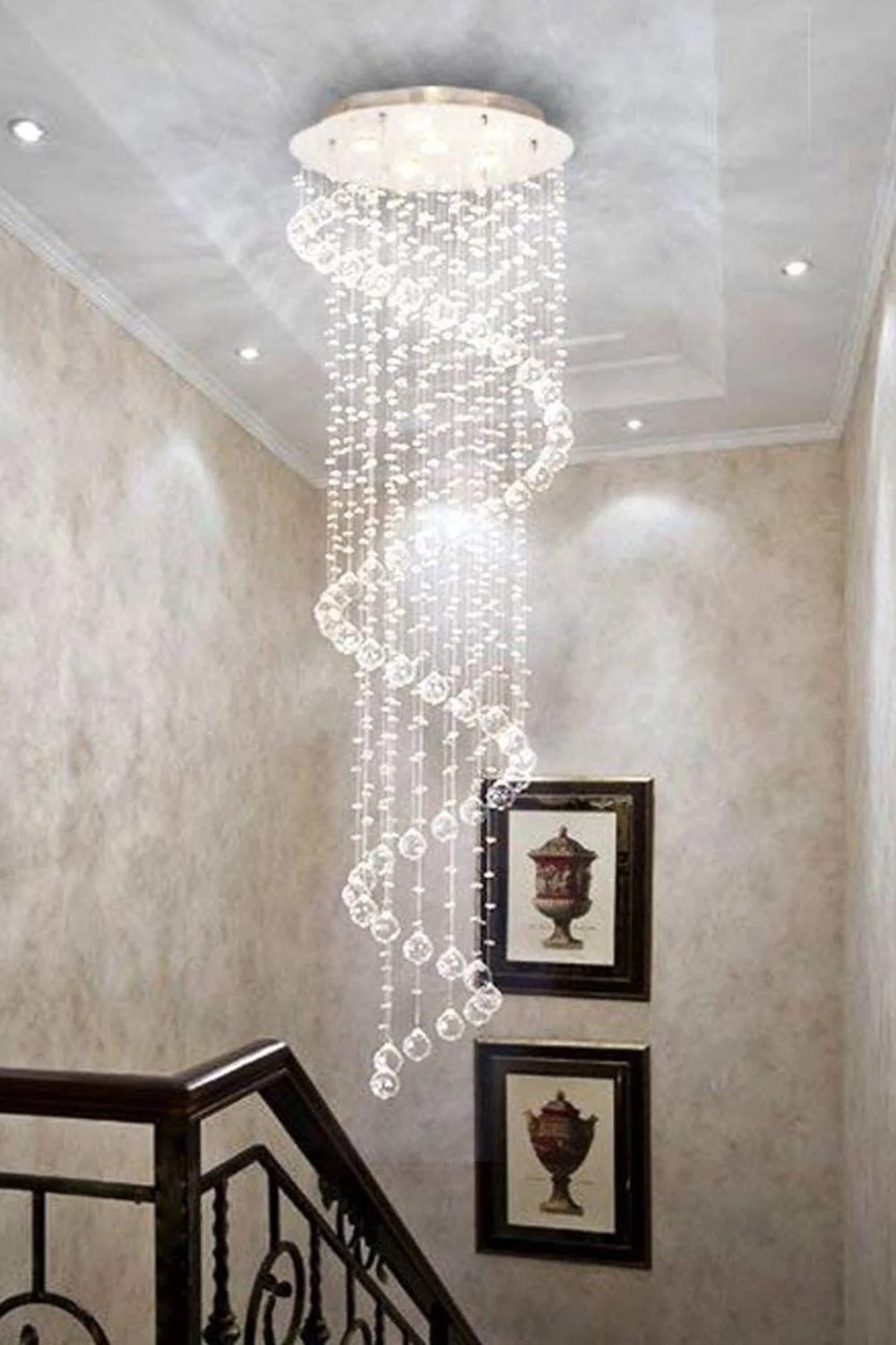Large Foyer Lighting For High Ceiling and Entryway with bright cascading raindrop crystals under a round ceiling canopy