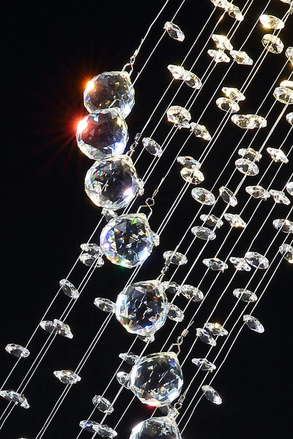Large Foyer Lighting For High Ceiling and Entryway close-up of crystal balls and raindrop strands