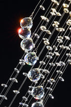 Large Foyer Lighting For High Ceiling and Entryway close-up of crystal balls and raindrop strands