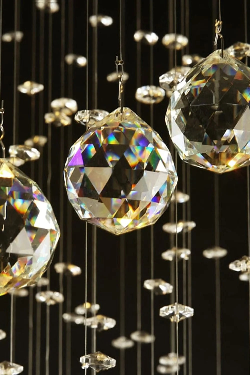 Large Foyer Lighting For High Ceiling and Entryway detail view of faceted crystal spheres and hanging strands