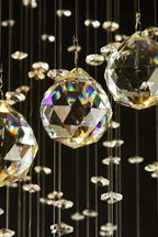 Large Foyer Lighting For High Ceiling and Entryway detail view of faceted crystal spheres and hanging strands