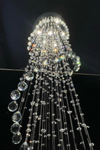 Detailed view of Large Foyer Lighting raindrop crystal chandelier crystal drops and lit canopy