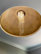 Large Foyer Lighting spiral raindrop crystal chandelier mounted in a gold ceiling recess