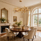 Lorna Berry Branch Shape Glass Chandelier above a formal dining table with arched windows