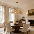 Lorna Berry Branch Shape Glass Chandelier over a round dining table in a classic interior