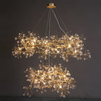 Side view of two tier Lorna Berry Branch Shape Glass Chandelier with warm lighting