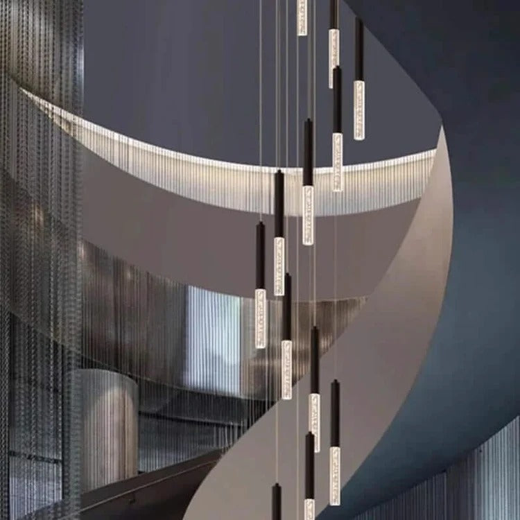 Lum Modern Black Foyer Chandelier For High Ceiling close view of suspended tube lights in a curved stairwell