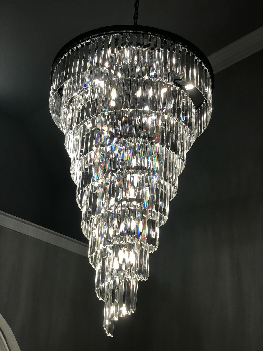 Luxury tiered crystal chandelier for foyer close up view