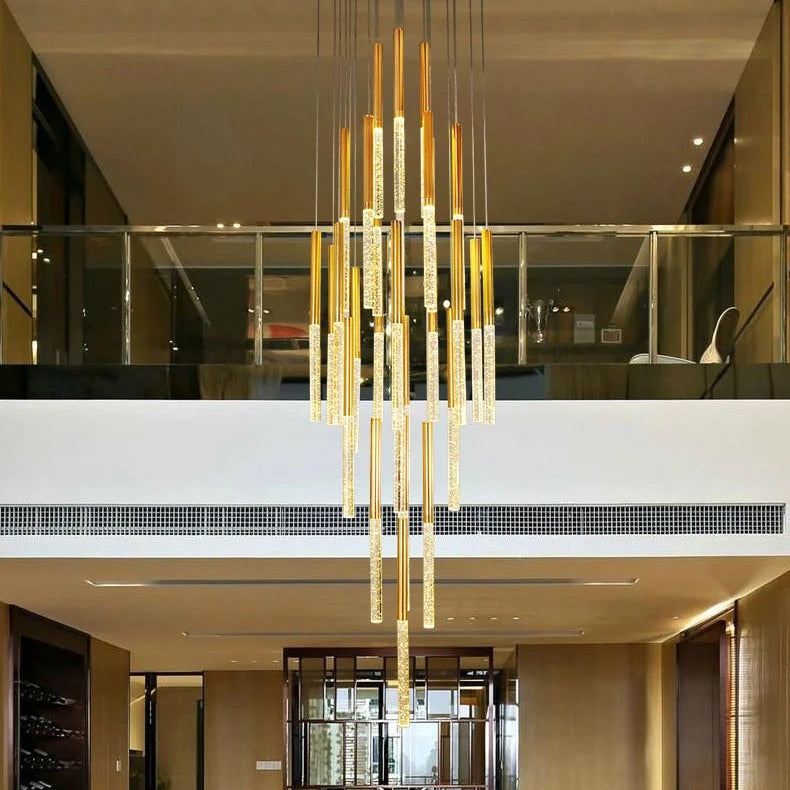 Mina Crystal Entryway Light Fixtures High Ceiling installed in a tall modern interior with gold crystal rods