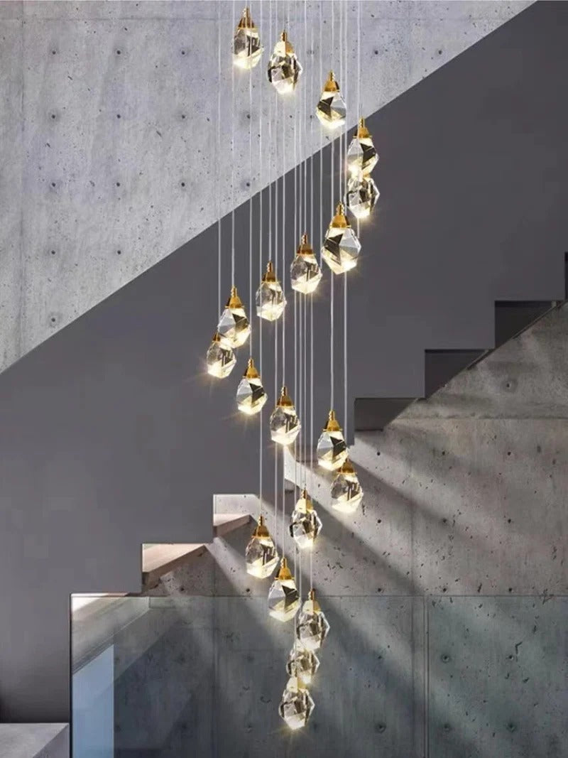 Modern Crystal Chandelier for High Ceiling Living Room arranged as a cascading cluster beside a concrete staircase
