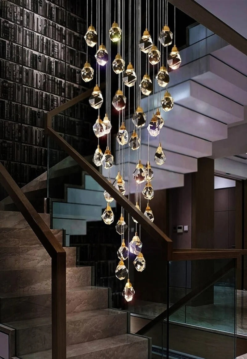 Modern Crystal Chandelier for High Ceiling Living Room with multiple crystal pendants in a dark staircase setting
