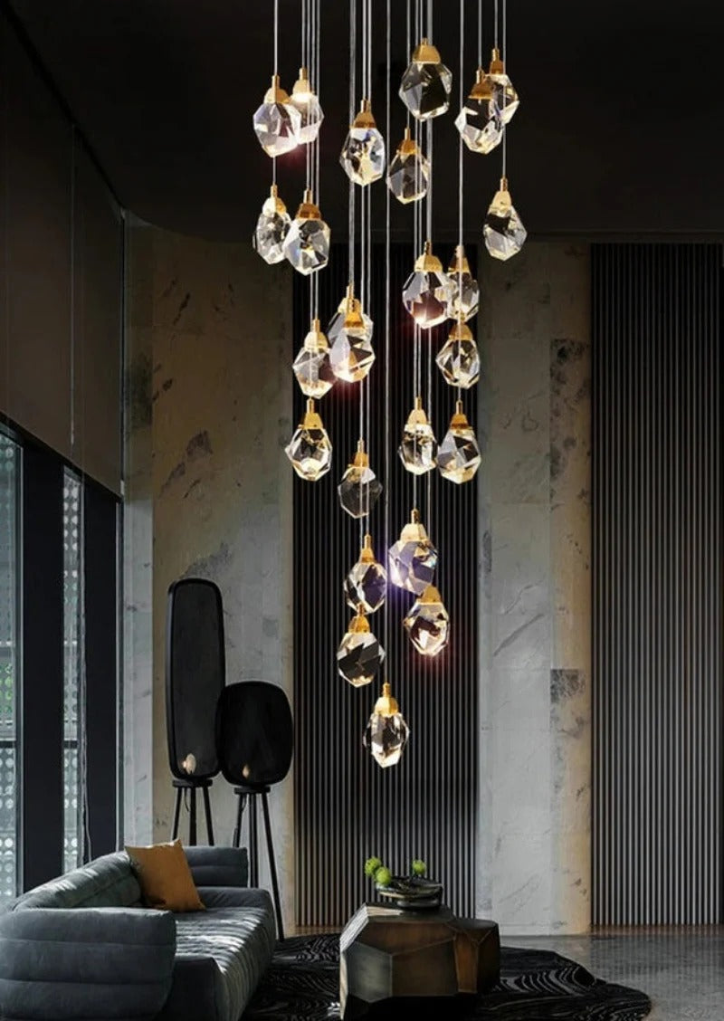 Modern Crystal Chandelier for High Ceiling Living Room shown as an artistic crystal pendant cluster in a modern living room