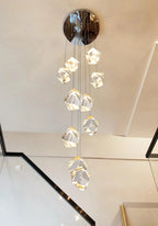 Modern Crystal Chandelier for High Ceiling Living Room close-up with gold hardware and faceted crystal pendants