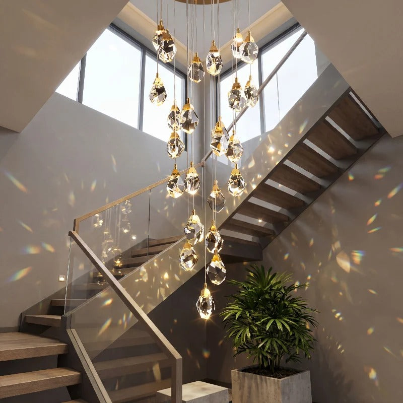 Modern Crystal Chandelier for High Ceiling Living Room creating warm reflections in a sunlit staircase and foyer