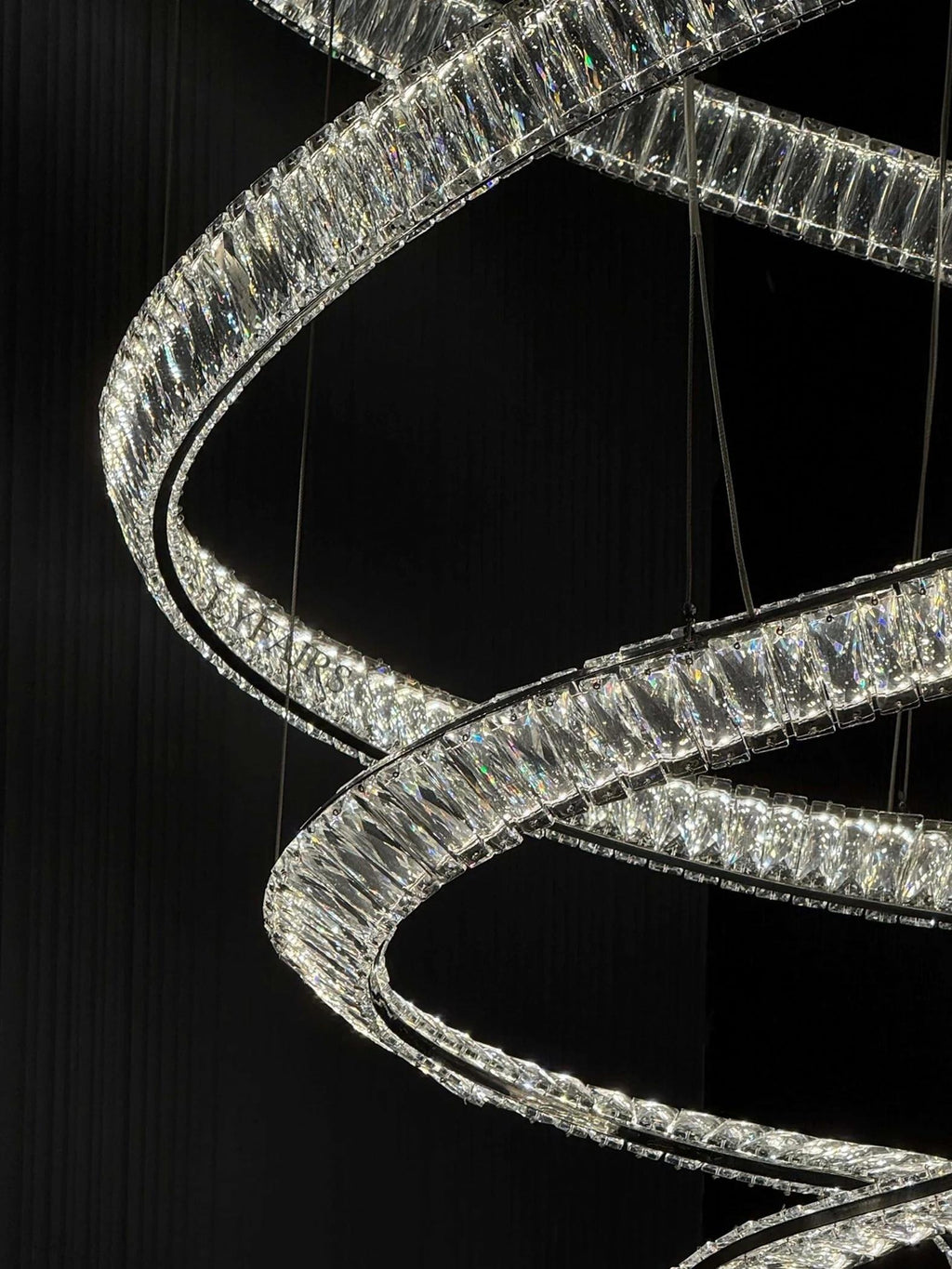 Modern Crystal Light Fixture for Staircase Foyer and High Ceiling close-up of clear crystal LED spiral rings