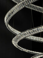 Modern Crystal Light Fixture for Staircase Foyer and High Ceiling close-up of clear crystal LED spiral rings