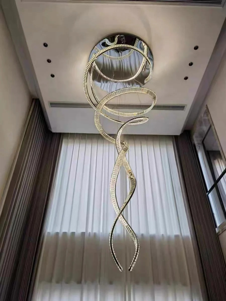 Modern Crystal Light Fixture for Staircase Foyer and High Ceiling installed near tall curtains with a polished ceiling plate