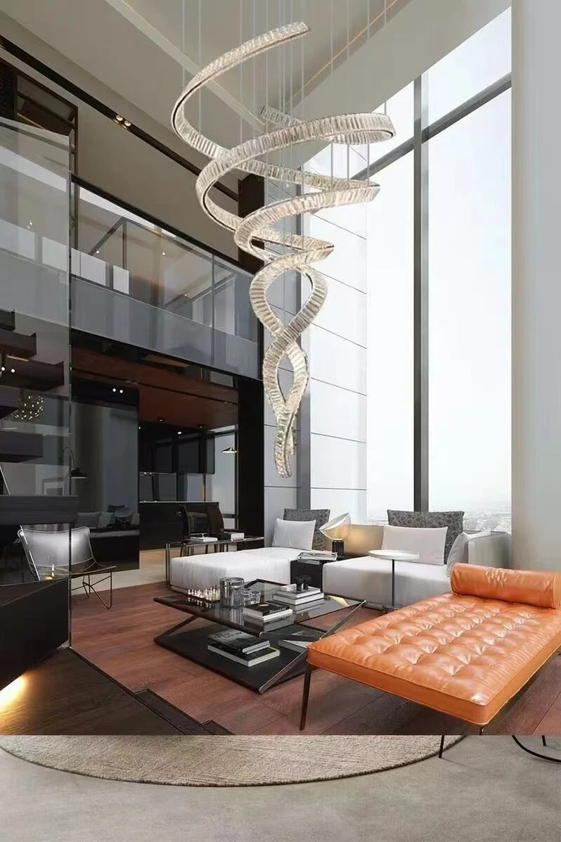 Modern Crystal Light Fixture for Staircase Foyer and High Ceiling in a loft living room with tall windows