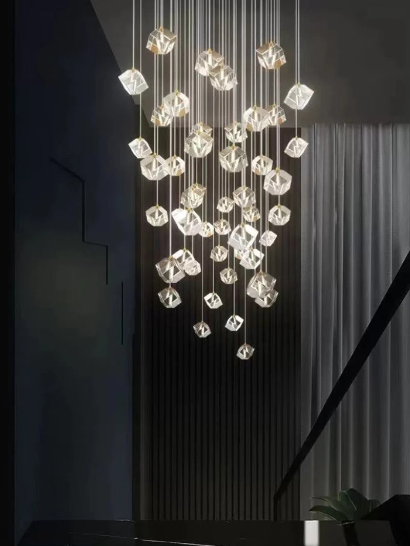 Modern Crystal Square Chandelier for Staircase in a dark stairwell with clustered illuminated cube crystals