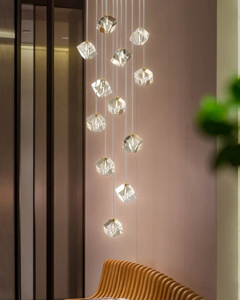 Modern Crystal Square Chandelier for Staircase in a minimalist interior corner with suspended cube crystals