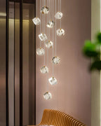 Modern Crystal Square Chandelier for Staircase in a minimalist interior corner with suspended cube crystals