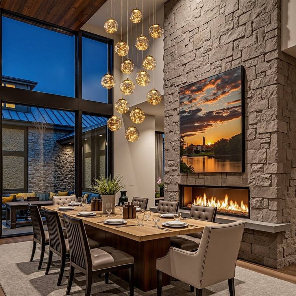 Modern Spiral Chandelier for Staircase above a dining room with stone fireplace and tall windows