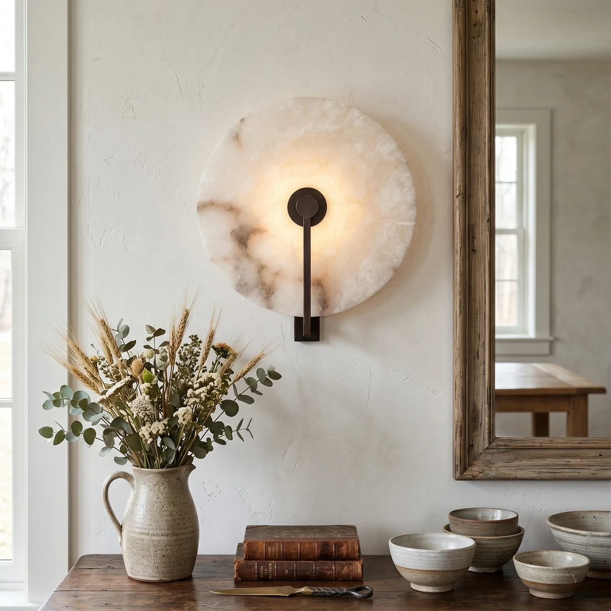 Natural Alabaster Disc LED Wall Sconce, entryway vignette | Bling Lighting Studio