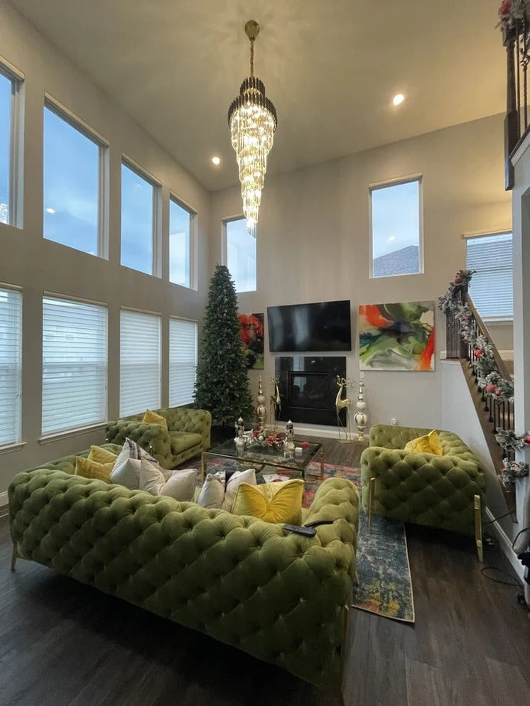 Olivia Crystal Modern Stair Chandelier installed in a great room with tall windows and high ceiling