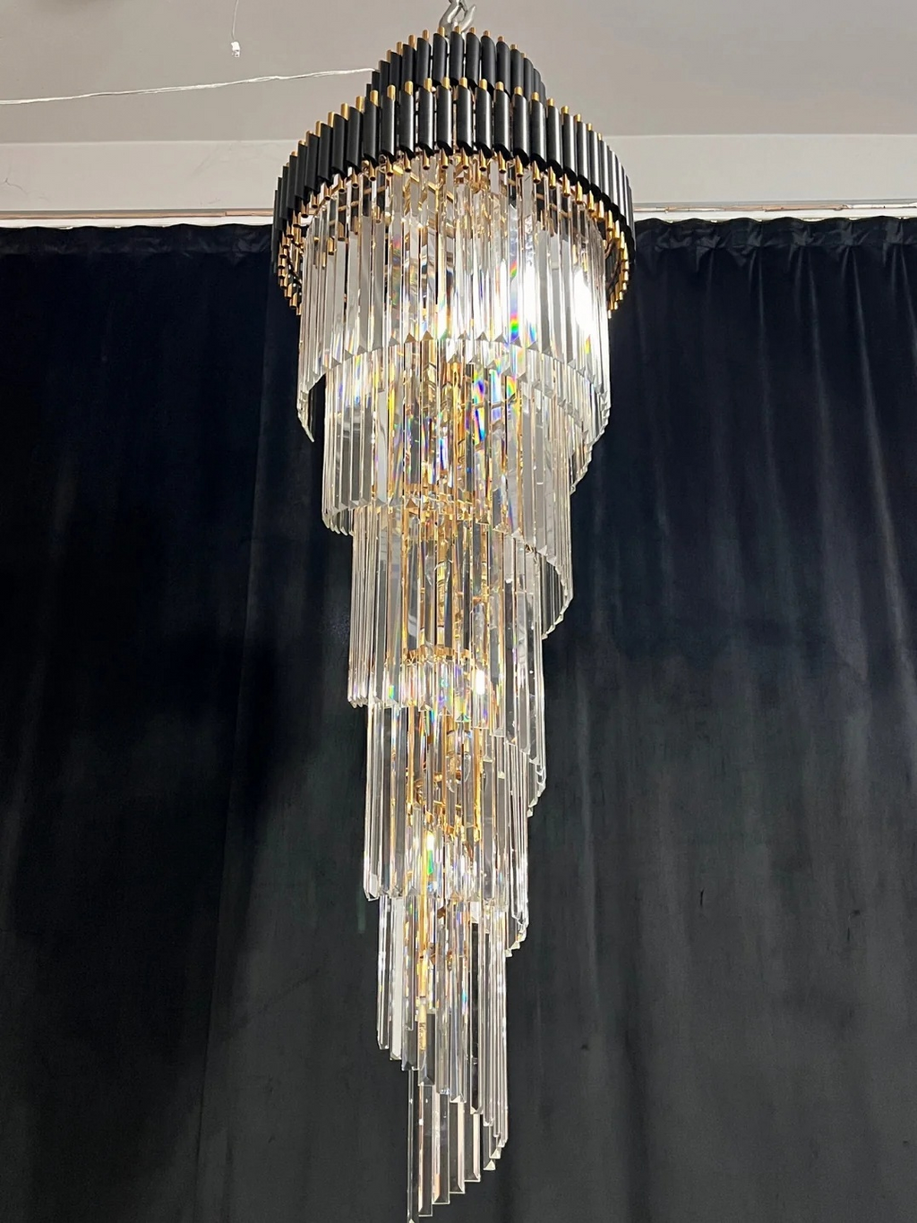 Olivia Crystal Modern Stair Chandelier side profile showing layered spiral crystal tiers