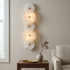 Cosmic Round Alabaster Wall Sconce by Bling Lighting Studio