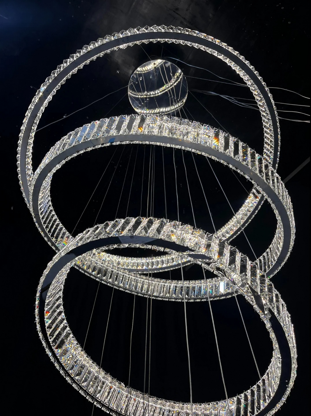 6 Tier Crystal Ring Chandelier for High Ceiling chrome finish close view of suspended crystal rings
