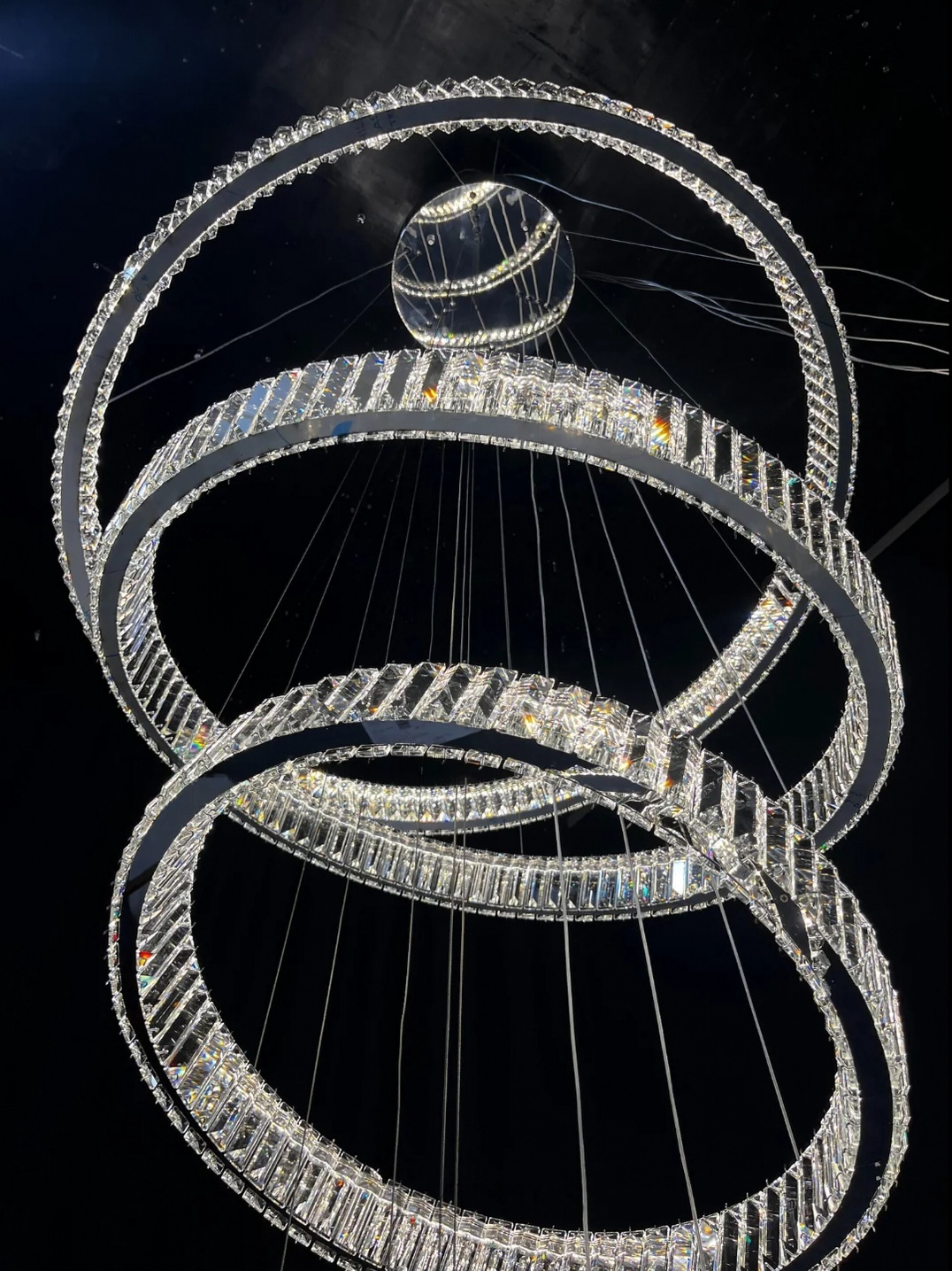 6 Tier Crystal Ring Chandelier for High Ceiling chrome finish close view of suspended crystal rings