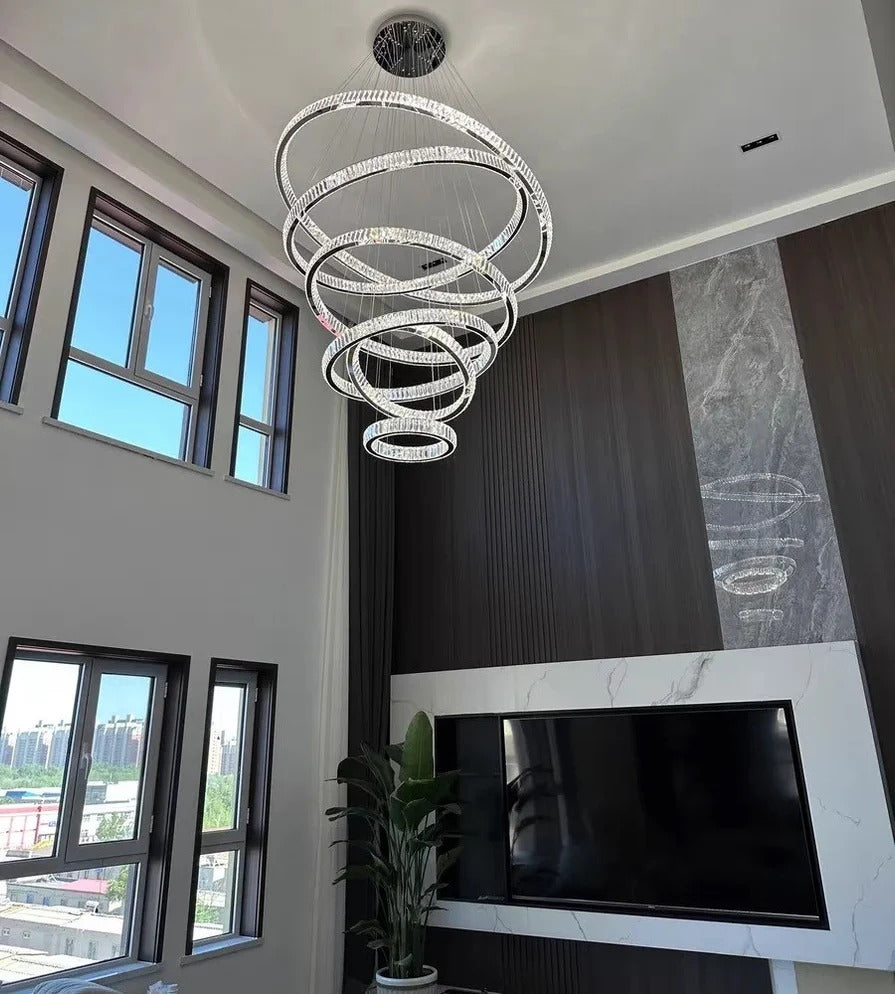 6 Tier Crystal Ring Chandelier for High Ceiling in chrome finish in a high ceiling living room