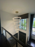 6 Tier Crystal Ring Chandelier for High Ceiling viewed from above in a tall open foyer