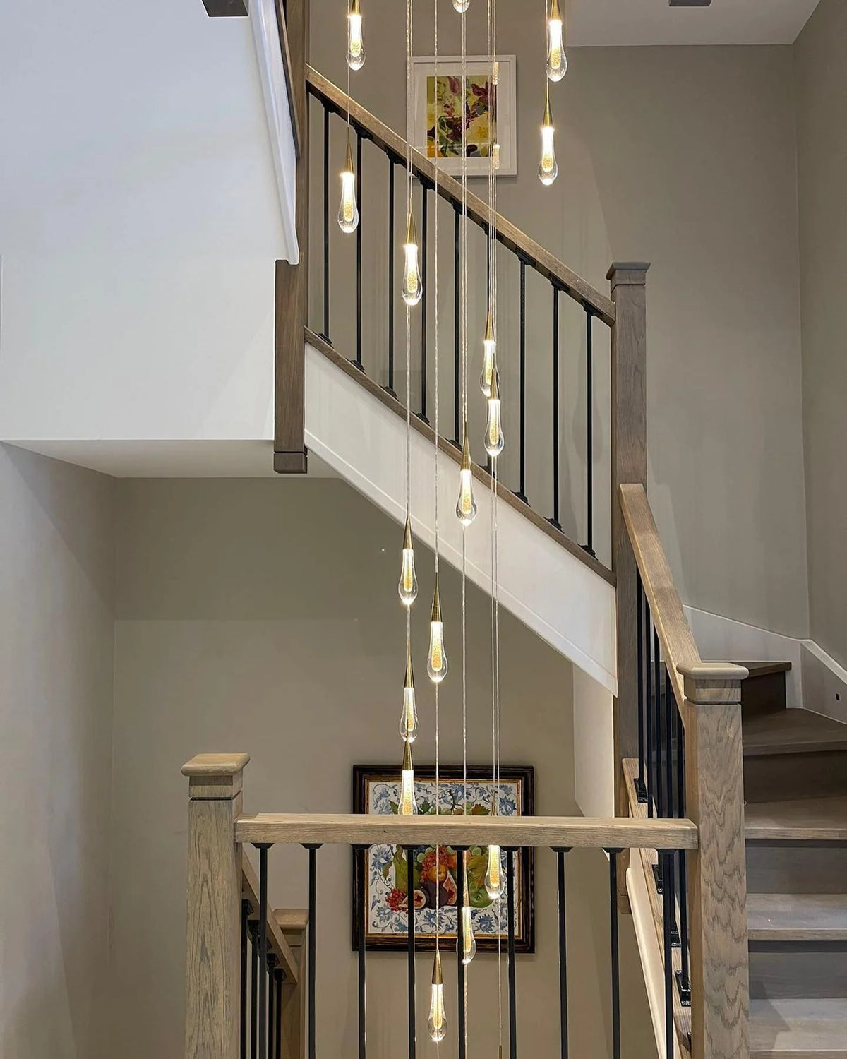 Spiral Raindrop Staircase Ceiling Lighting cascading pendant installation for modern stairwell